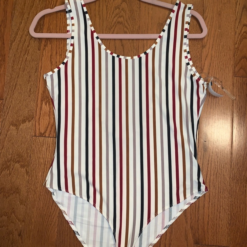 Fun multicolored one piece with low back size medium